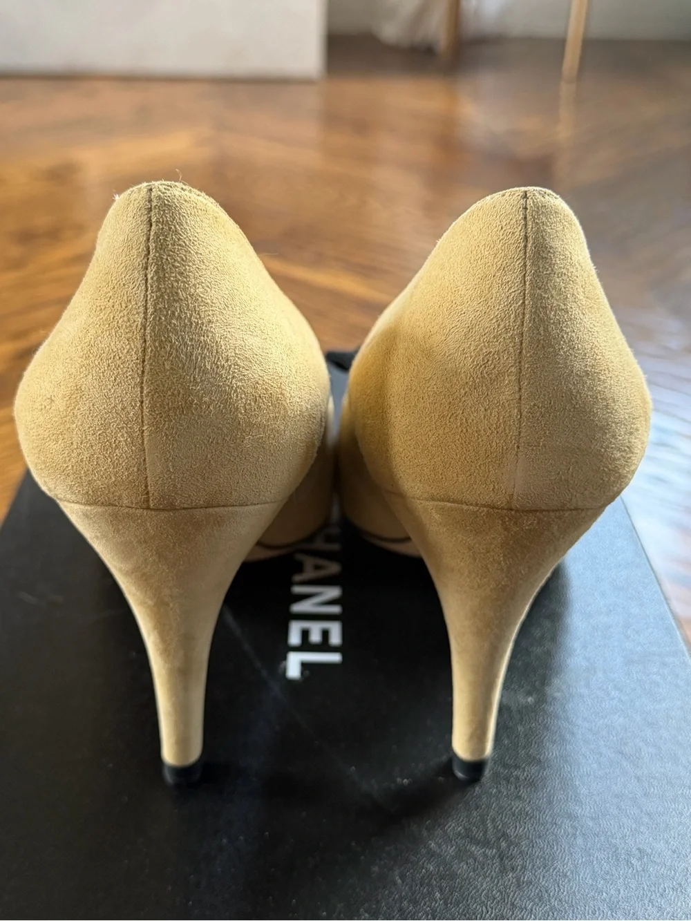 CHANEL Two-Tone Suede & Fabric Bow Pumps in Beige and Black